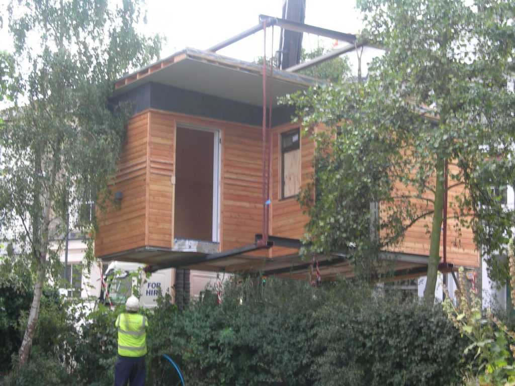 prefabricated ecoshed being placed on site