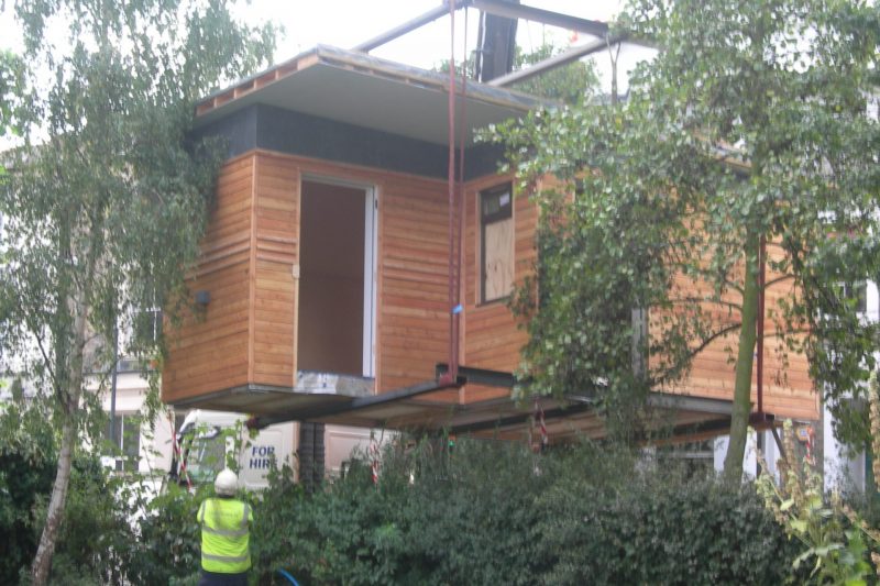 prefabricated ecoshed being placed on site