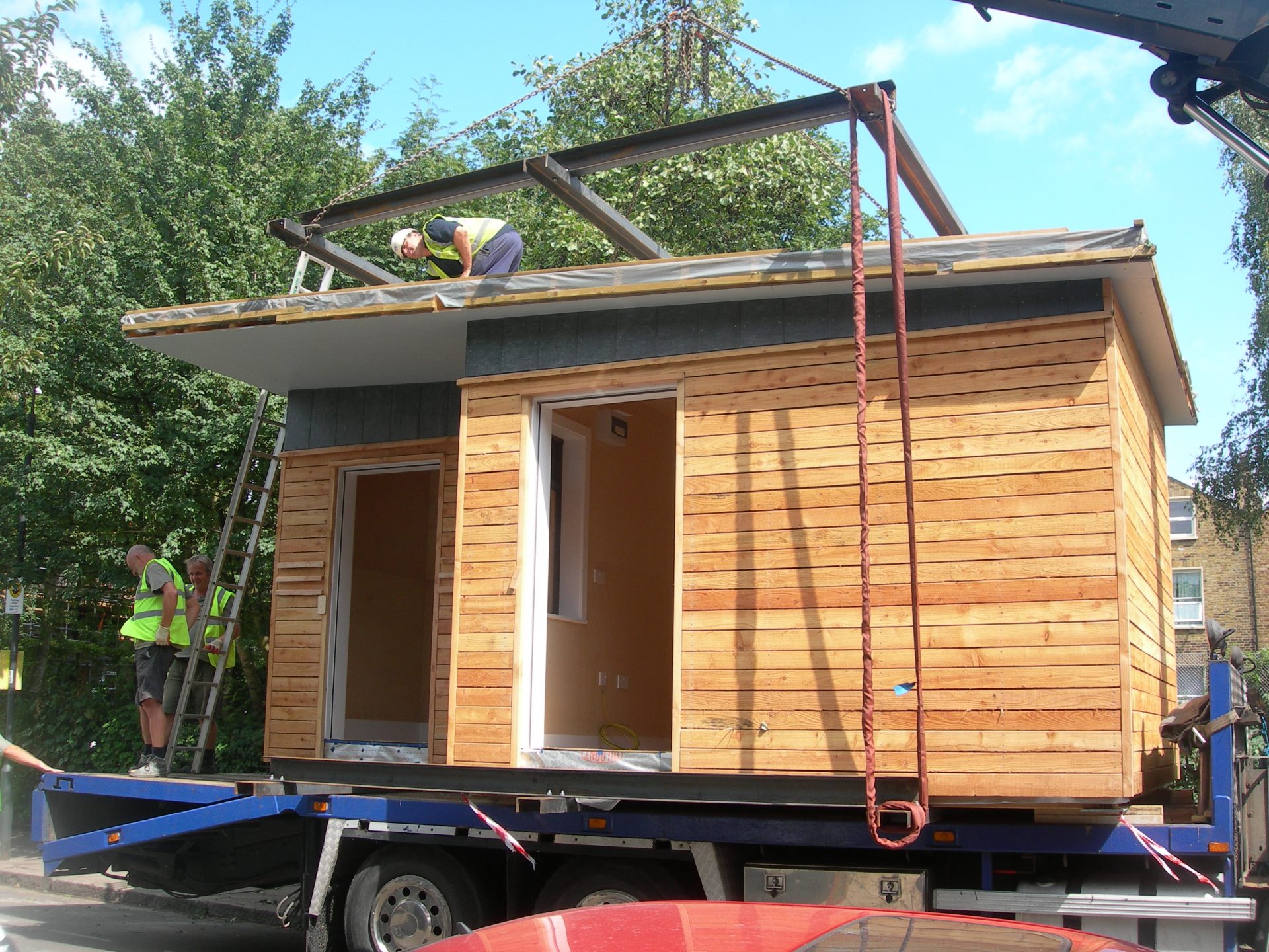 Prefabricated Ecoshed being transported to site