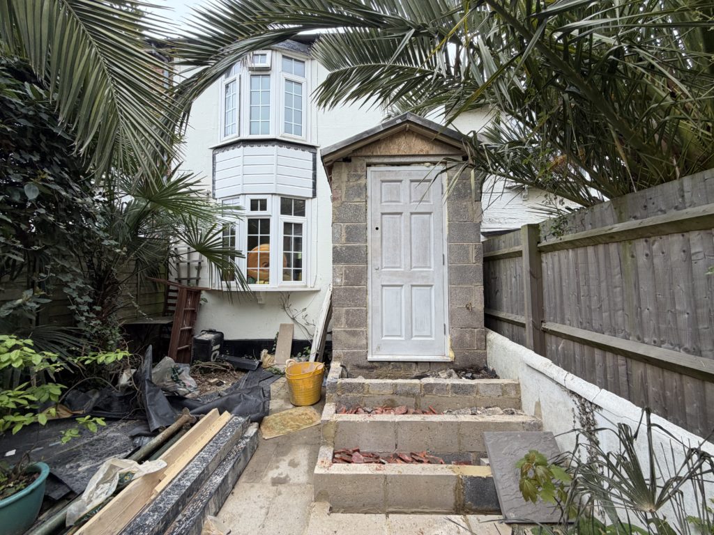 Proposed view of rear extension in Brighton, showing new structure adjoining the existing house.