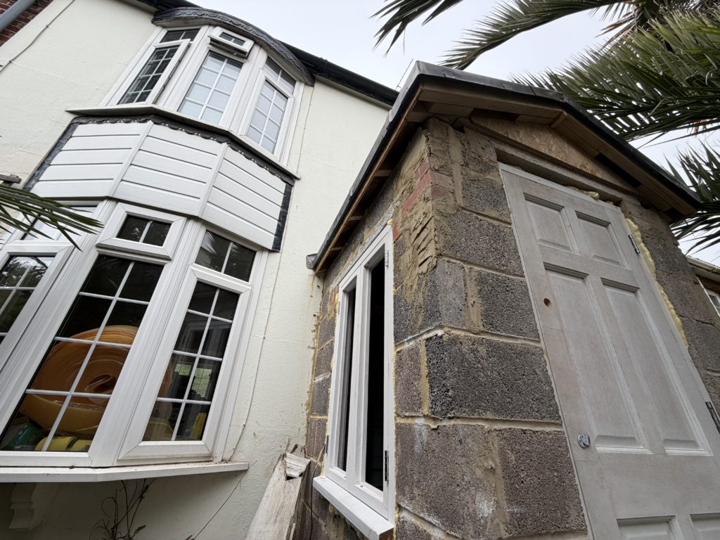 Proposed rear extension to a Brighton house showing new outbuilding structure within the garden setting.